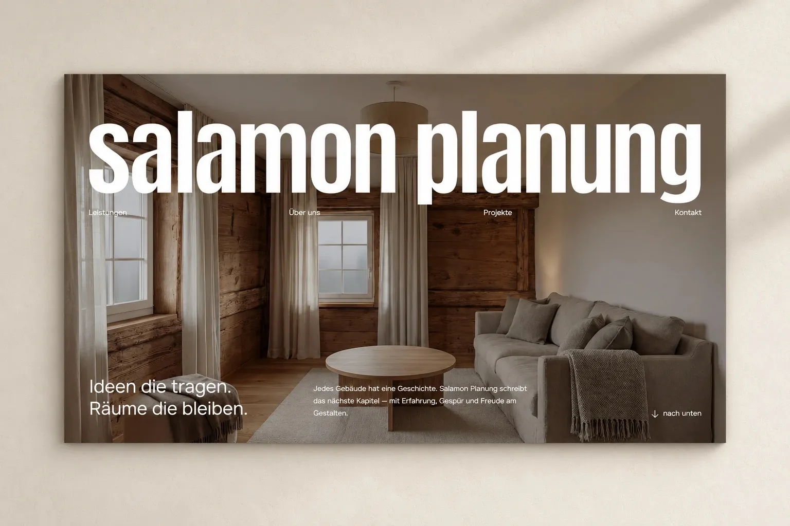 Startseite von Salamon Planung mit grosser Wortmarke über einem Wohnraum